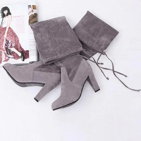 Gray suede over-the-knee boots with a block heel and drawstring tie.