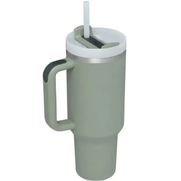 A sleek, matte sage green insulated tumbler with a white lid and black grip handle.