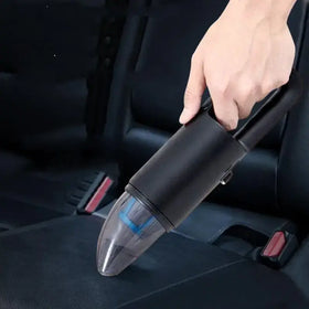 Black handheld car vacuum with transparent dust collection chamber and blue internal components