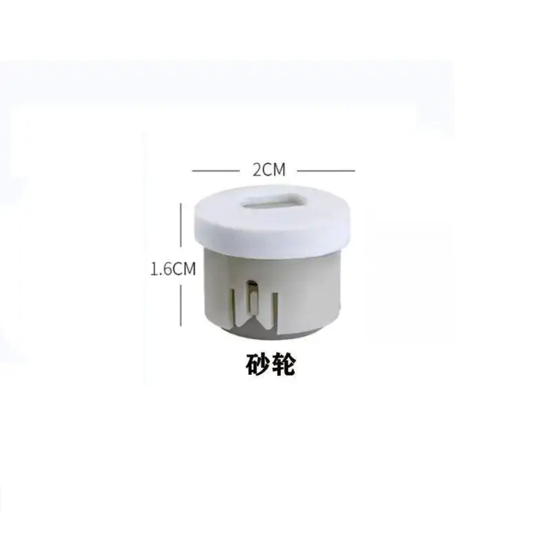 White and gray plastic sanding wheel with a circular top featuring an oval cutout.