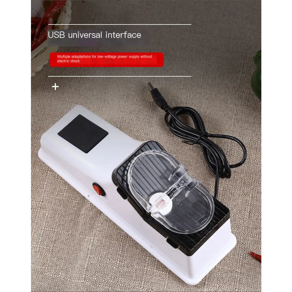 White plastic usb-powered electric knife sharpener with black accents, clear protective cover over the sharpening mechanism.