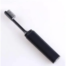 Black electric toothbrush with a sleek, cylindrical handle and soft bristles.