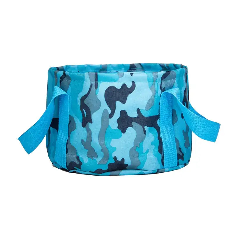 Blue camouflage-patterned fabric bucket with matching blue handles.