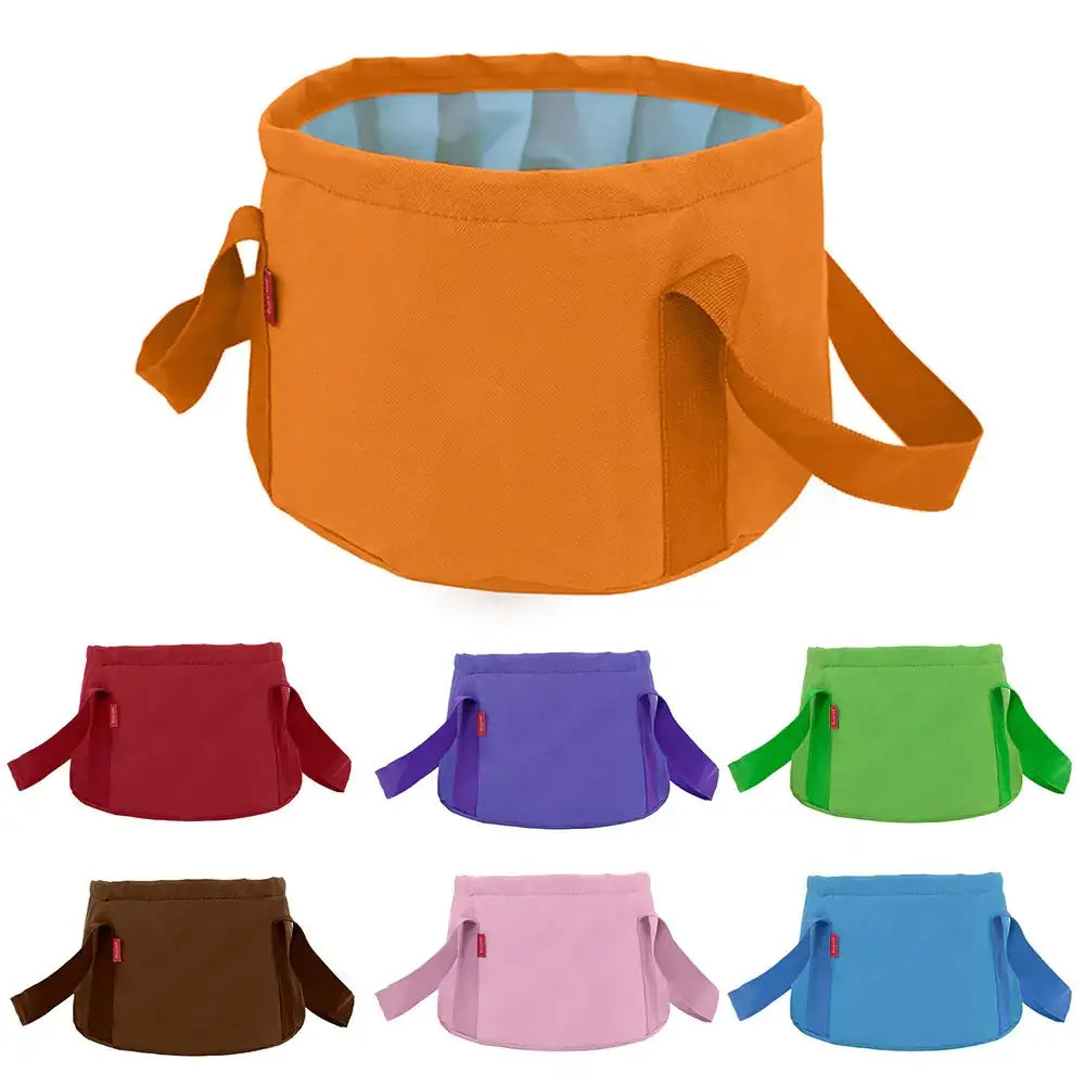 Orange collapsible foldable bucket with light blue interior lining and fabric handles.