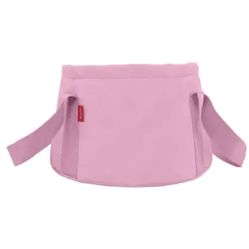 Pink fabric baby carrier with adjustable straps and a small red brand tag.