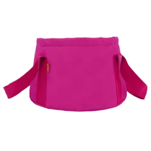 A vibrant fuchsia-colored fabric baby carrier with adjustable straps and a small red brand tag on the side.