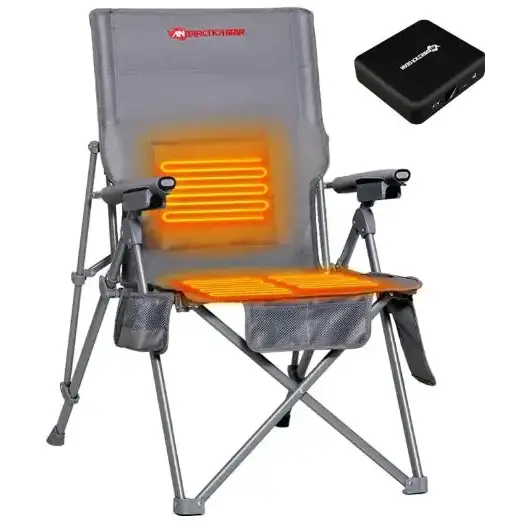 Gray folding camp chair with built-in heating elements glowing orange on the seat and backrest, featuring mesh side pockets and a black power adapter nearby.