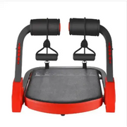 Red and black abdominal exercise machine with padded handles and a textured platform.