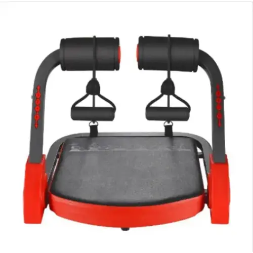 Red and black abdominal exercise machine with padded handles and a textured platform.
