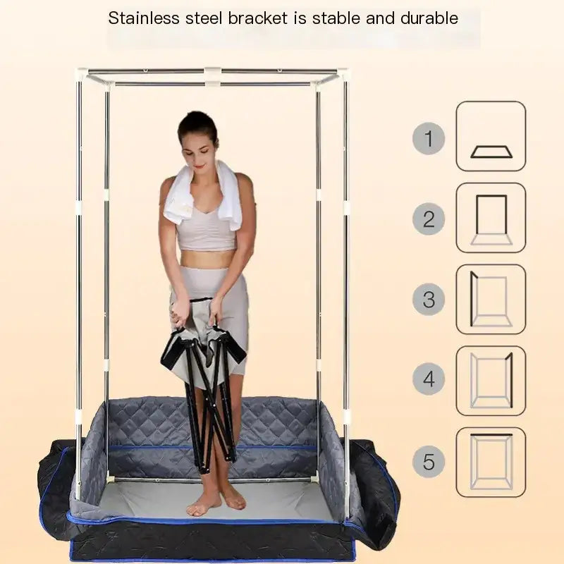 A portable, foldable steam sauna with a stainless steel frame and quilted gray interior lining.