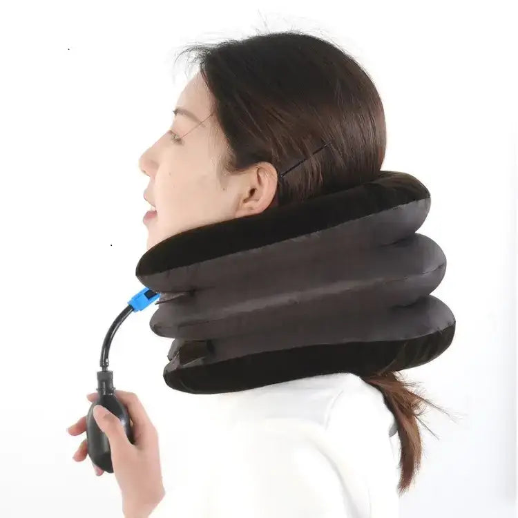 Black inflatable neck pillow with a blue valve and black pump handle