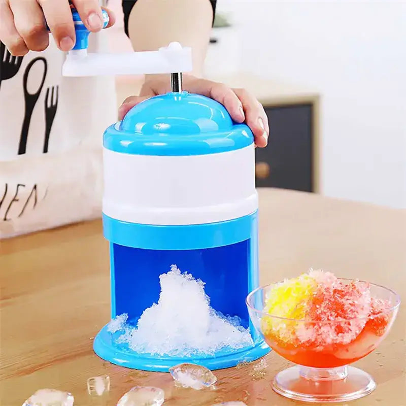 Blue and white handheld snow cone maker with a transparent blue chamber.
