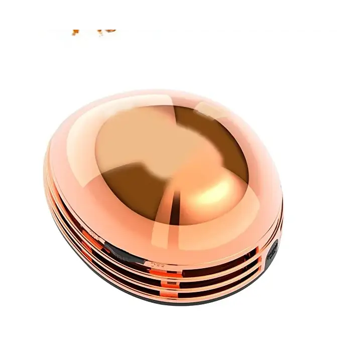 Rose gold-colored, sleek and rounded cordless vacuum cleaner with a glossy finish.