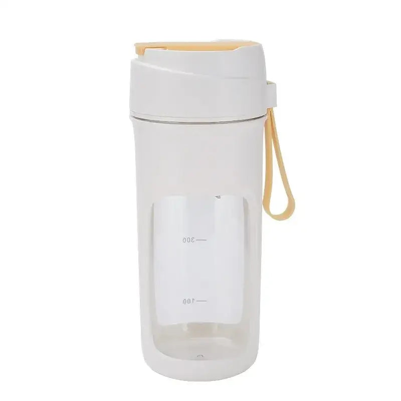 White and beige travel blender with a clear body, white lid, and carrying strap