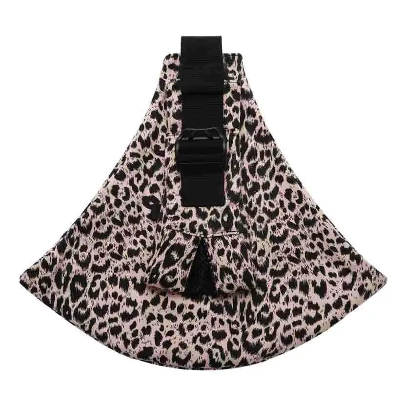Pink and black leopard print fabric carrier with a central black strap and buckle.