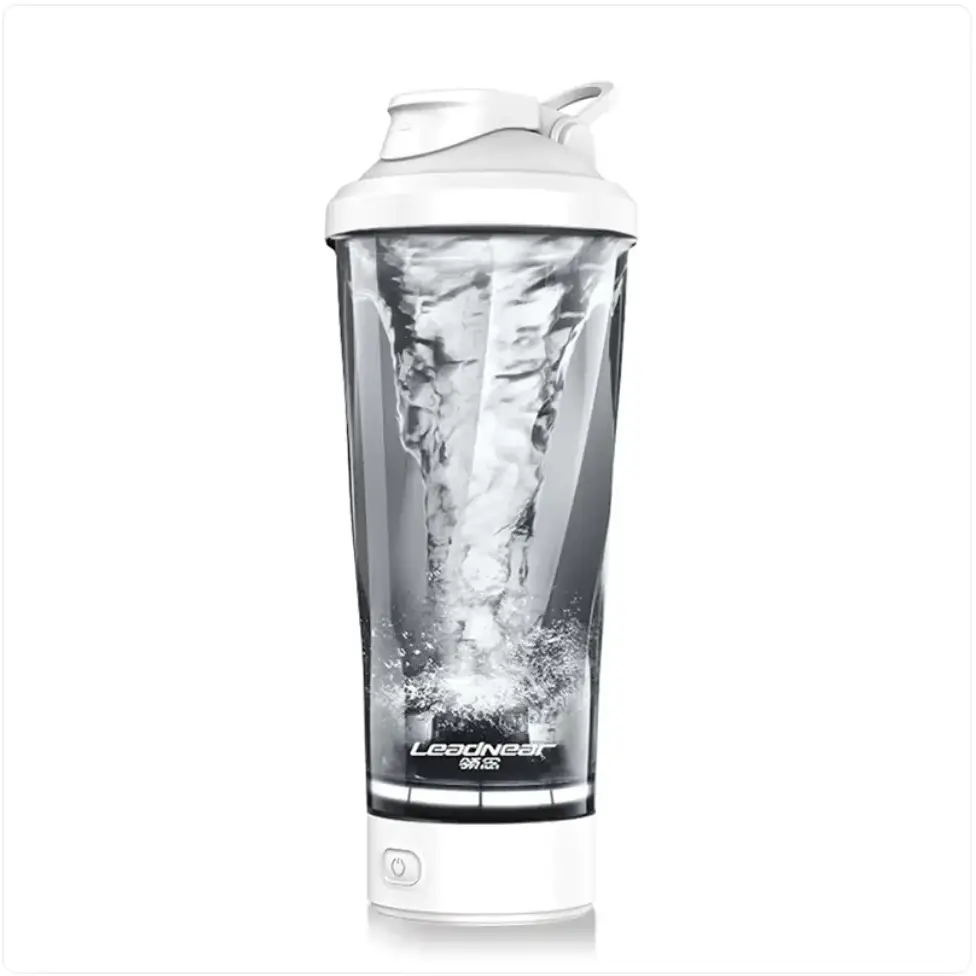 White plastic and clear glass shaker bottle with a built-in motor for mixing drinks.