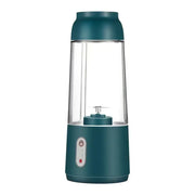 Teal-colored portable blender with a clear glass container and metallic blade assembly.