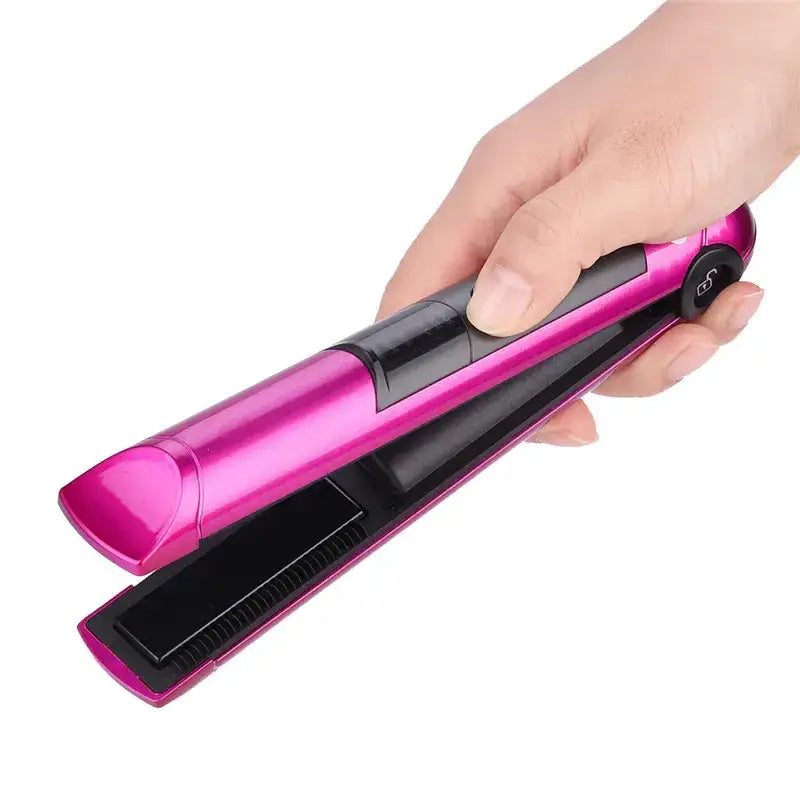 Pink and black handheld hair straightener with a sleek, glossy finish.
