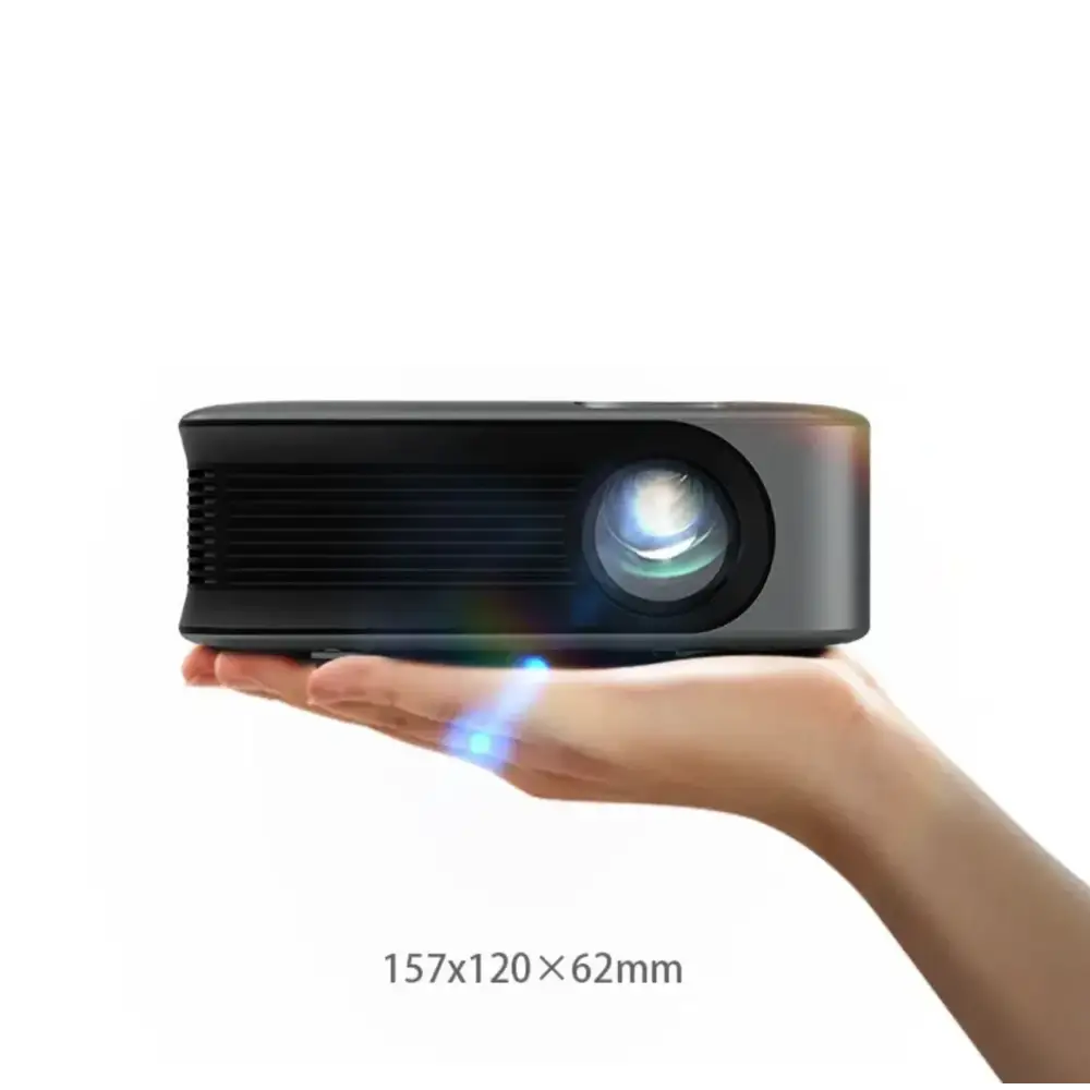 Compact black projector with a sleek, modern design and a prominent lens emitting a soft blue glow.