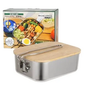 Stainless steel camping lunchbox with a bamboo lid and a metal handle.