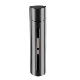 Black cylindrical travel-sized electronic cigarette with a sleek metallic finish and vertical slot for battery or cartridge access.