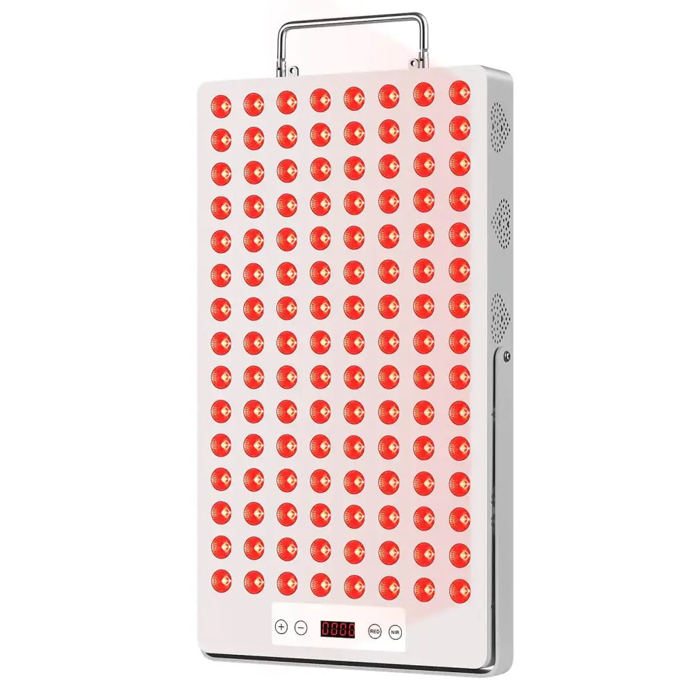 White rectangular led therapy panel with a grid of red circular lights, silver handle and side vents.