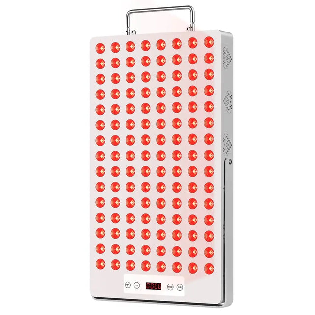 White rectangular led therapy panel with a grid of red circular lights, silver handle and side vents.
