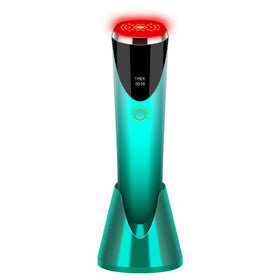 Teal-colored handheld device with a red glowing circular head and black display panel showing timer, resting on matching teal stand.