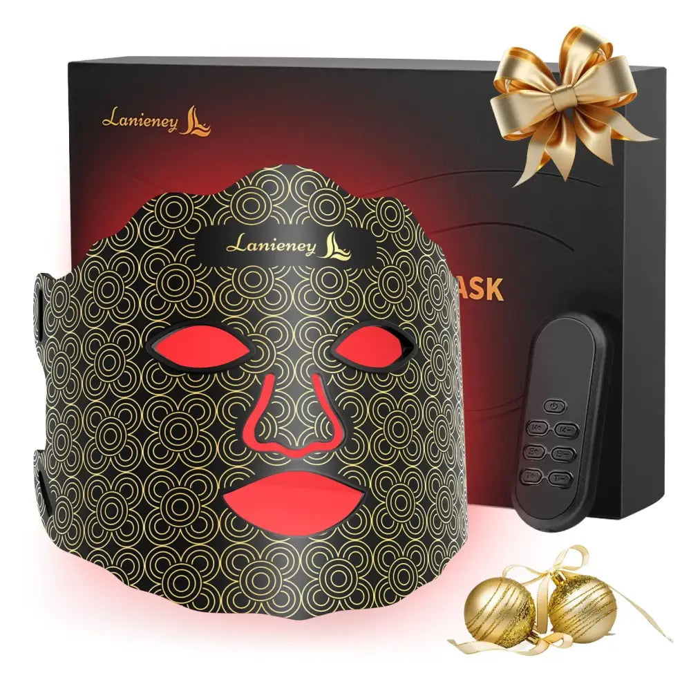 Black lanieney facial mask with gold circular patterns and red illuminated eye, nose, and lip cutouts.