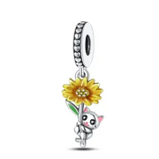 A charming silver cat charm holding a yellow sunflower, featuring pink inner ears and detailed green leaves.