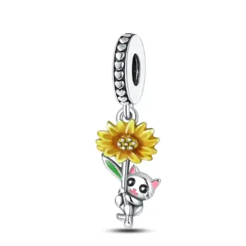 A charming silver cat charm holding a yellow sunflower, featuring pink inner ears and detailed green leaves.