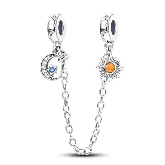 Silver-toned charm bracelet with a moon and star pendant on one side, featuring a blue gemstone at its center, and a sun pendant on the other side adorned with an orange cabochon stone.