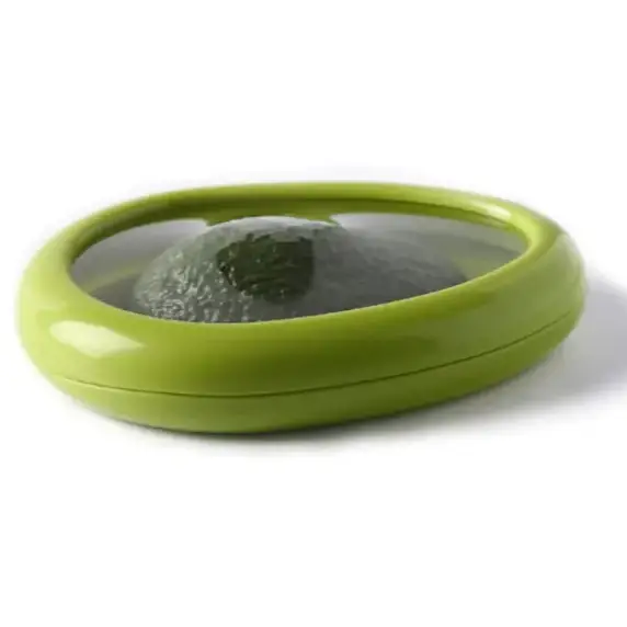 A lime green oval-shaped avocado keeper with a clear lid, designed to preserve the fruit’s freshness.