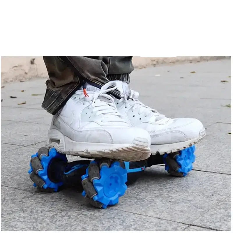 White nike air max sneakers with blue robotic wheels attached underneath.