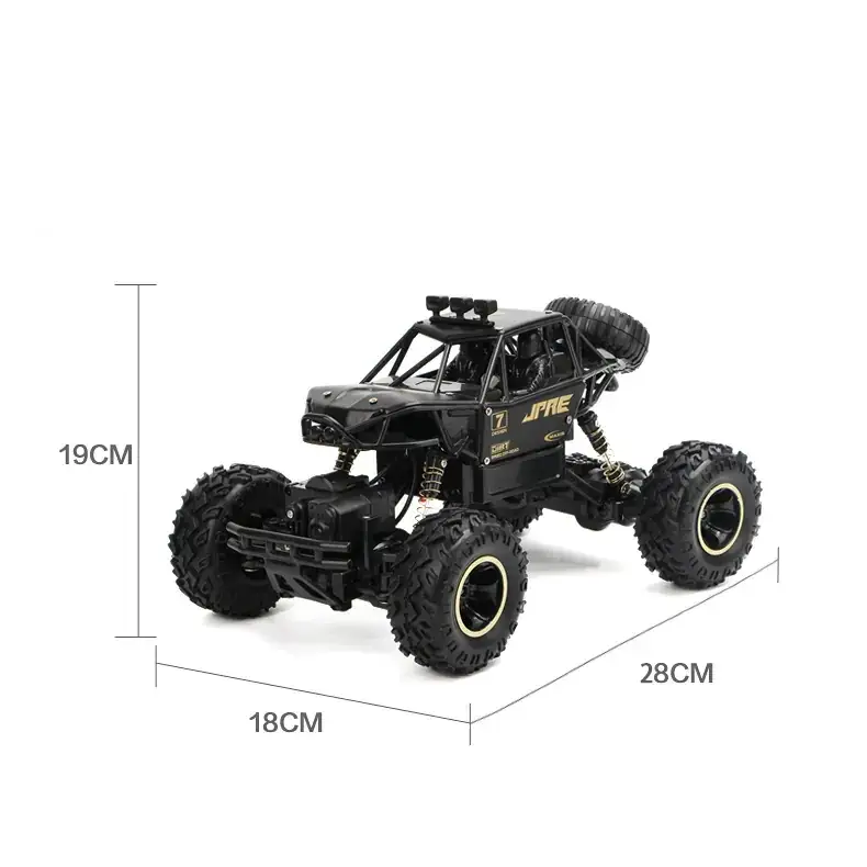 Black remote-controlled off-road truck with gold lettering and detailing, featuring oversized rugged tires and a spare tire mounted on the back.