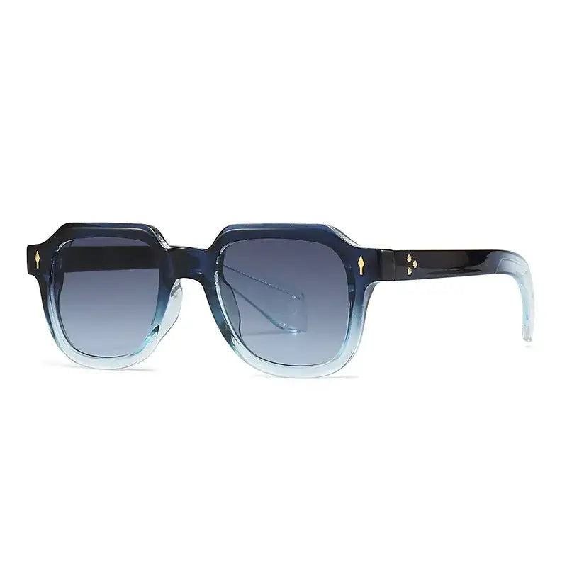 Blue gradient acetate sunglasses with gold-tone diamond-shaped accents on the temples.