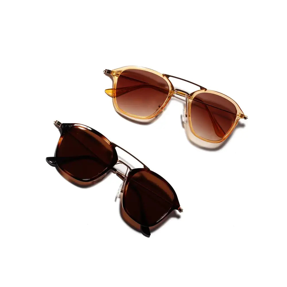 A pair of stylish, double bridge sunglasses with tortoiseshell and gold-tone frames.