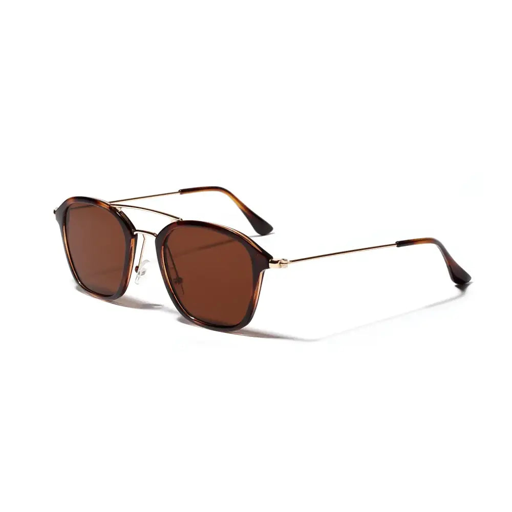 Brown tortoiseshell-framed sunglasses with gold-tone metal bridge and temples.