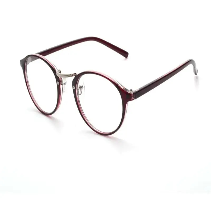 Maroon round-framed glasses with a sleek, translucent plastic design and metallic bridge.