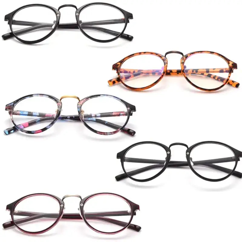 Round-framed eyeglasses in black, tortoiseshell, and multicolored patterns with thin metal or plastic frames.