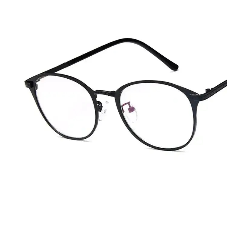 Black round-framed reading glasses with clear lenses and a sleek, minimalist design.
