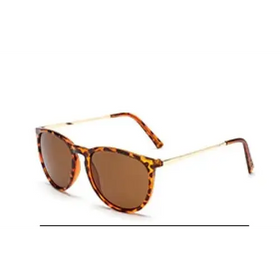 Tortoiseshell-patterned sunglasses with gold-tone metal frames and brown lenses.