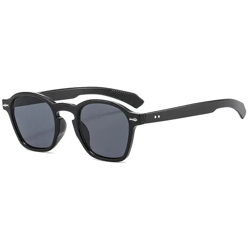 Black acetate-framed sunglasses with dark gray lenses and a retro square design.