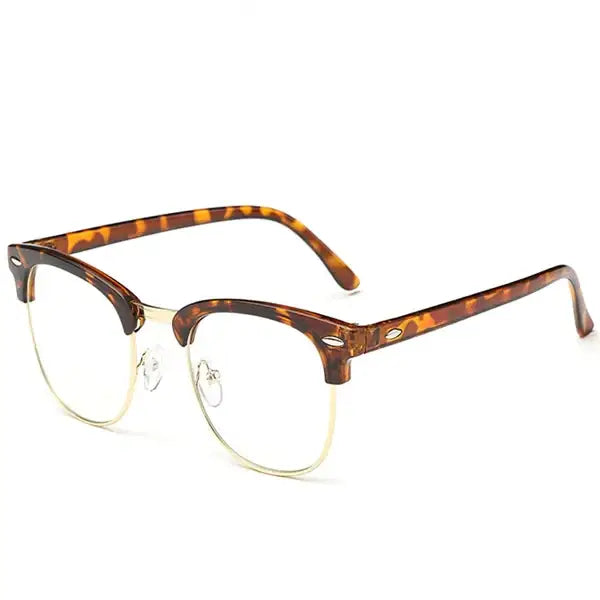 Tortoiseshell acetate half-rim glasses with gold-tone metal detailing.
