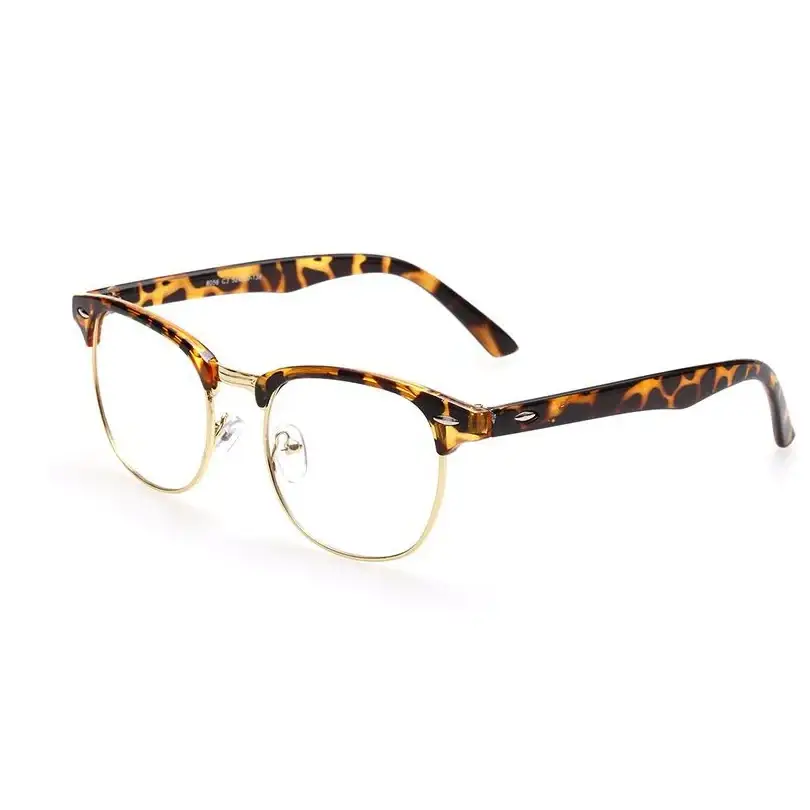 Tortoiseshell-patterned acetate eyeglasses with gold-toned metal rims and clear lenses.