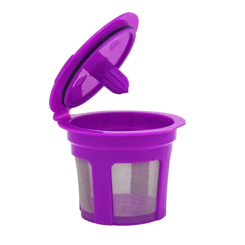 Purple plastic k-cup coffee filter with a hinged lid and mesh sides.