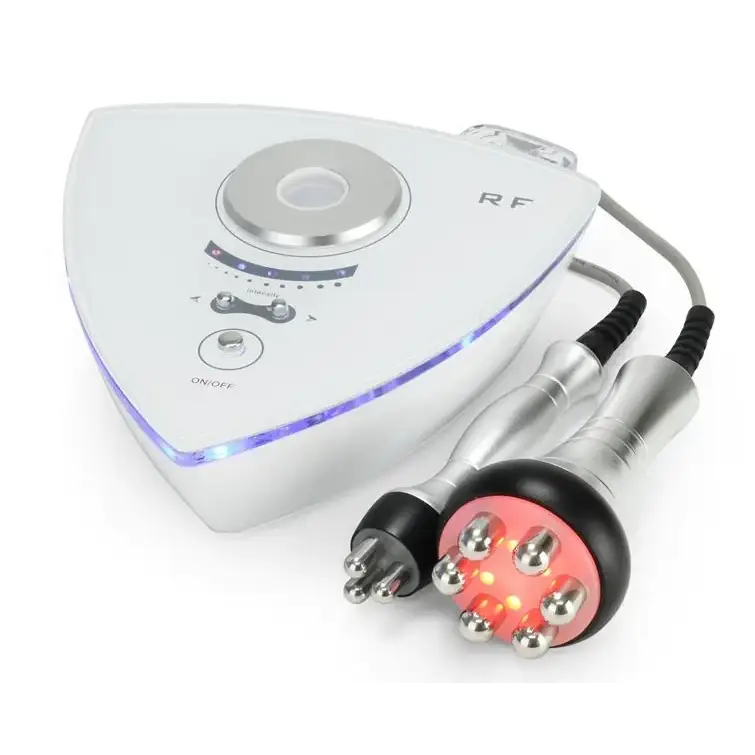 White triangular rf beauty device with silver accents and glowing blue led lights, featuring two handheld attachments—one with metallic probes and another with a red illuminated circular head.
