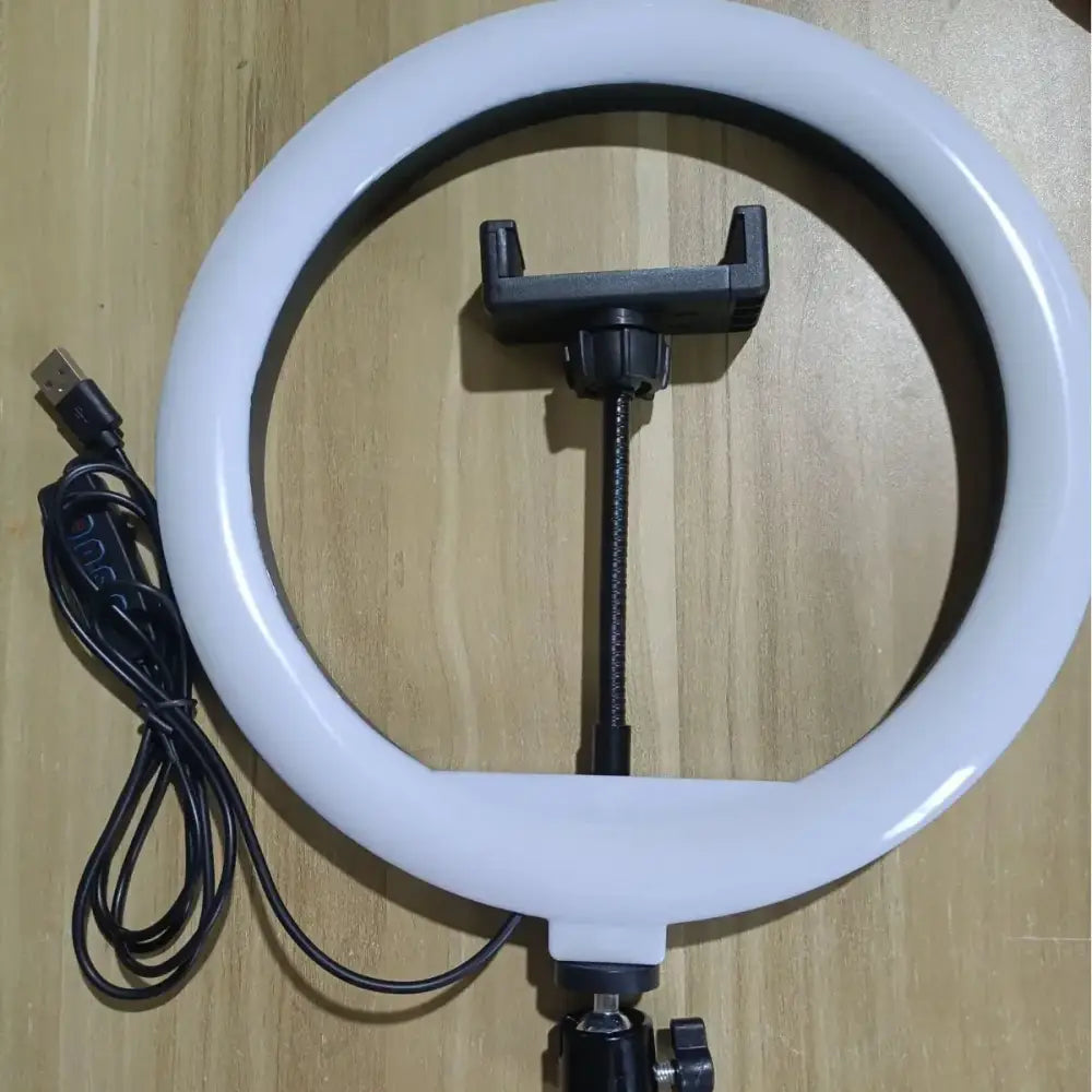 White led ring light with black phone mount and adjustable stand.