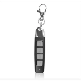Black remote control with silver buttons labeled a through d and a chrome keychain attachment.