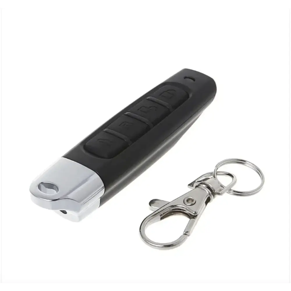 Black and silver remote control with four buttons, featuring a metallic clip-on keychain.